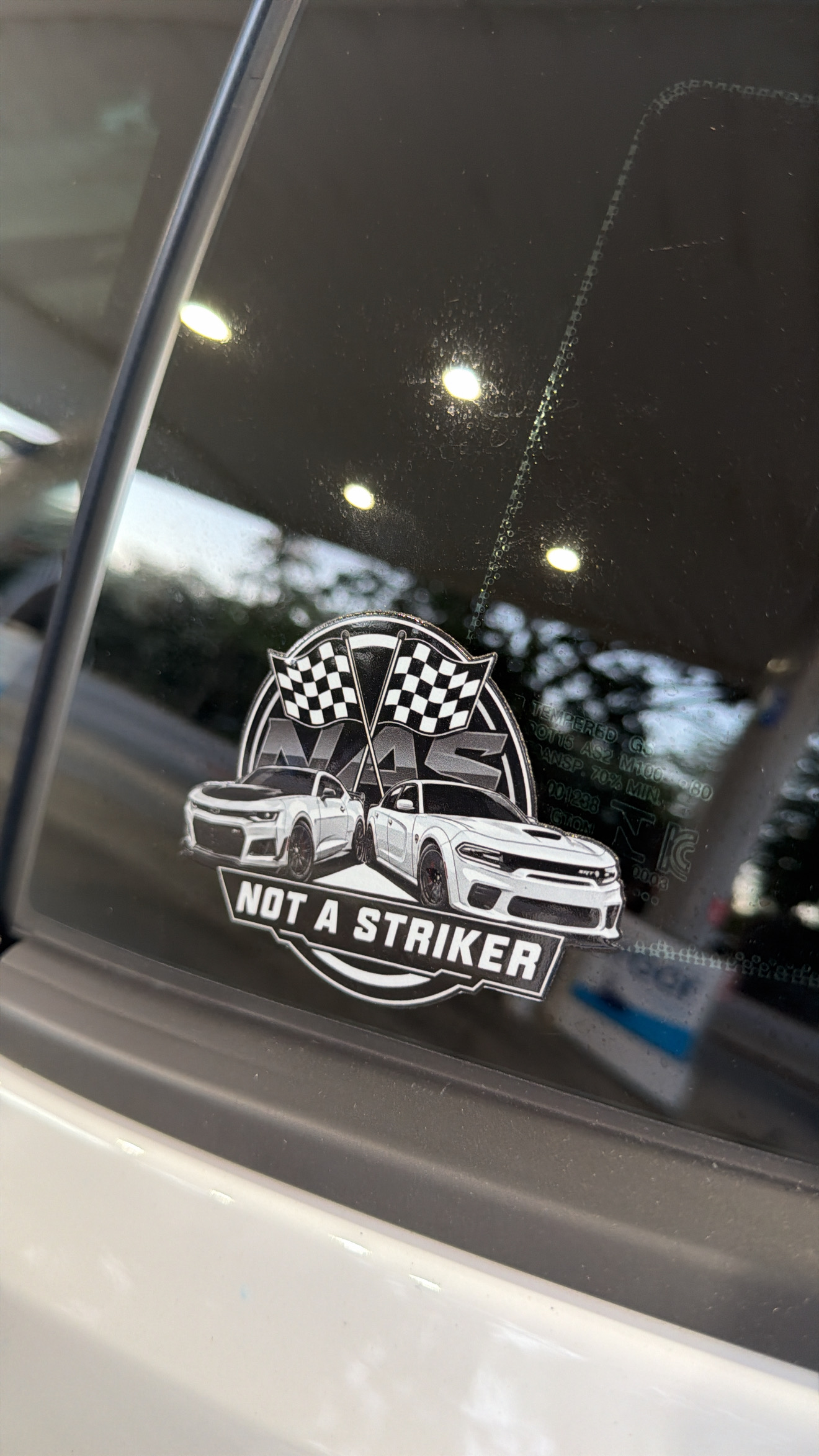NAS Not A Striker decal on a car window